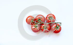 Fresh cherry tomatoes isolated on white background