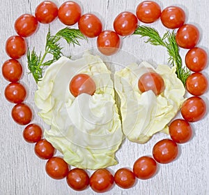 Fresh cherry tomatoes served in a heart shape