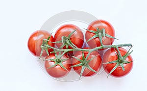 Fresh cherry tomatoes on white background