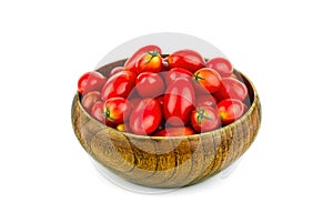 Fresh cherry tomatoes in a wooden bowl