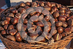 Fresh chestnuts in the brown basket