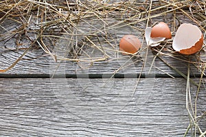 Fresh chicken brown eggs on rustic wood, organic farming concept background