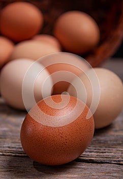 Fresh chicken eggs in basket