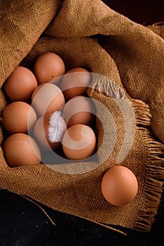 Fresh chicken eggs in burlap. Hen. egg. Easter.