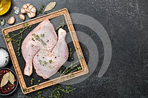 Fresh chicken legs  on cutting board