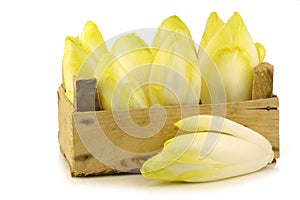 Fresh chicory in a wooden crate