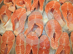 Fresh chilled raw salmon steaks