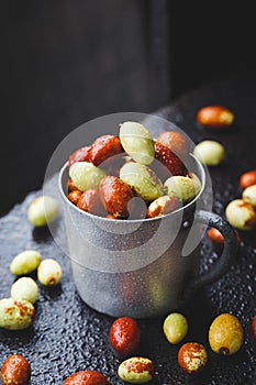 Fresh Chinese date fruits-Ziziphus jujuba fruits on the dark background