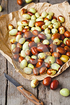 Fresh Chinese date fruits-Ziziphus jujuba fruits on the dark background