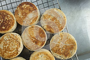 Fresh chinese pancake on stainless grid. Sao-ping is culture dessert of chinese