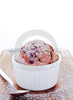 Fresh chocolate muffin baked in ramekin