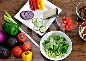 Fresh chopped and prepared ingredients for making homemade tacos and nachos for delicious tasty family dinner