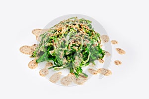 Fresh chuka seaweed salad isolated on white. Japanese cuisine.