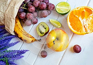 Fresh citrus fruits on a old wooden table.