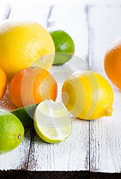 Fresh citrus fruits on white