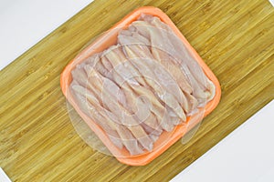 Fresh and clean chicken breast cut julien