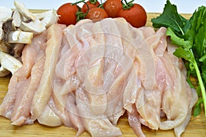 Fresh and clean chicken breast cut julien