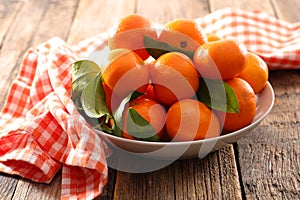 Fresh clementine and leaf