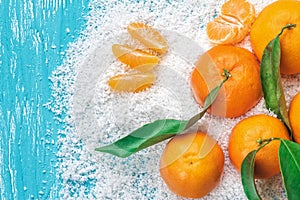 Fresh clementines in snow