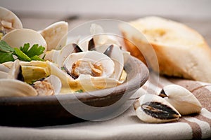 Fresh Cockle clams (Venus, Meretrix) with wine sauce. Portuguese
