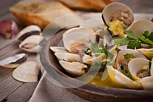 Fresh Cockle clams (Venus, Meretrix) with wine sauce. Portuguese