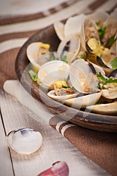 Fresh Cockle clams (Venus, Meretrix) with wine sauce. Portuguese