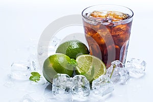 Fresh cocktail with cola drink and lime