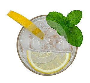 Fresh cocktail lemonade, honey lemon soda with yellow lime slice and mint top view isolated on white background, clipping path