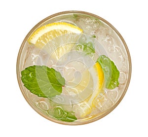 Fresh cocktail lemonade, honey lemon soda with yellow lime slice and mint top view isolated on white background, path