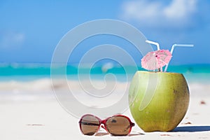 Fresh coconut cocktail on a tropical beach