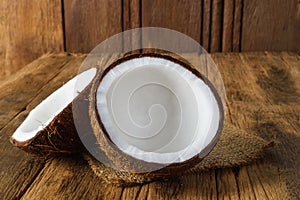 Fresh coconuts on old wooden