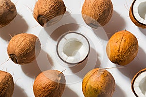 Fresh coconuts presented against a pristine white background