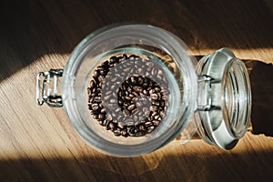 Fresh coffee beans in the airlock bottle