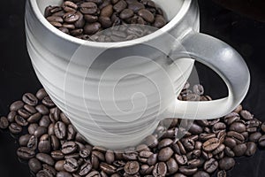 Fresh Coffee Beans Close Up with a mug