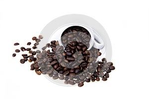 Fresh coffee beans in a cup with a saucer on a white background