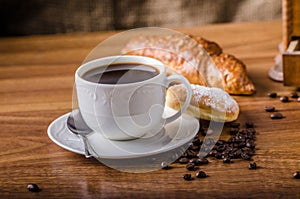 Fresh coffee with croissant photo