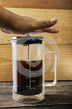 Fresh coffee in a French press coffee maker