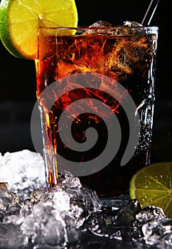 Fresh cola drink with green lime