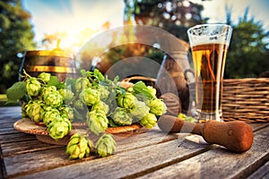 Fresh cold beer glass in rustic setting