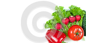 Fresh colorful organic vegetables captured from above top view, flat lay isolated on a white background. Layout with free copy