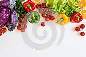 Fresh colorful organic vegetables on a white background, farming and healthy food concept. Copy space. Flat lay