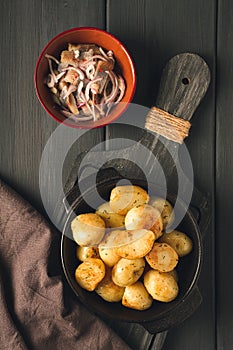 Fresh Cooked, new potatoes,with dill, on a wooden table, selective focus. close-up, toning, no people,