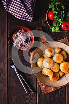 Fresh Cooked, new potatoes,with dill, on a wooden table, selective focus. close-up, toning, no people,