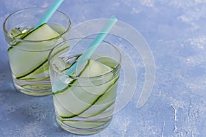 Fresh cool detox drink with cucumber, lemonade in a glass