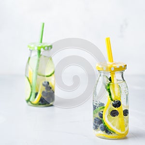 Fresh cool lemon cucumber berry infused water detox drink