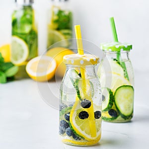 Fresh cool lemon cucumber berry infused water detox drink