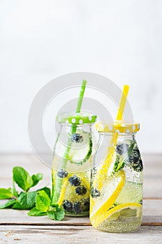 Fresh cool lemon cucumber berry infused water detox drink