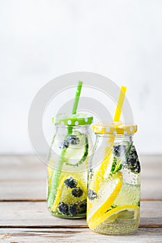 Fresh cool lemon cucumber berry infused water detox drink