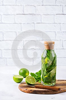 Fresh cool lemon lime mint infused water detox drink