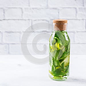 Fresh cool lemon lime mint infused water detox drink